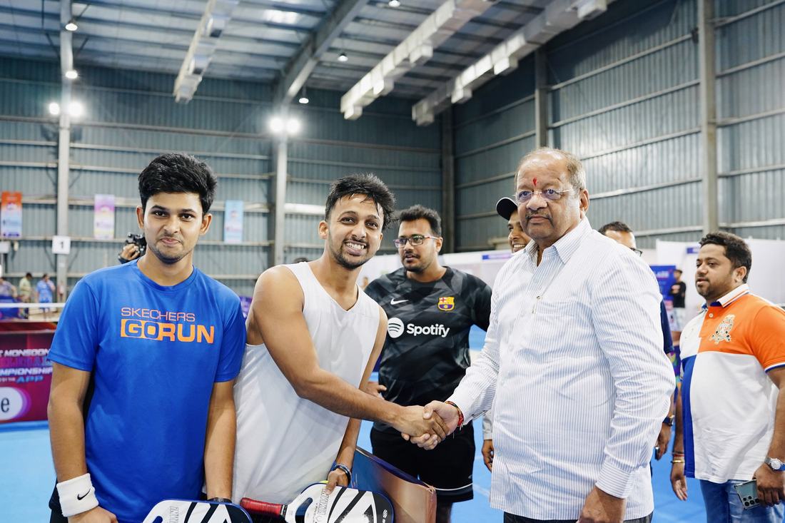 Monsoon Championship handshake