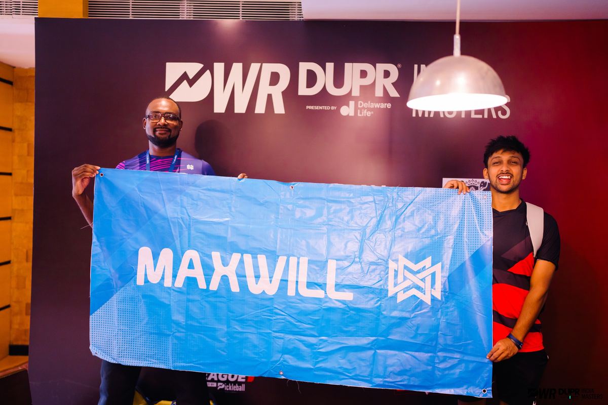 Holding the Maxwill banner at PWR DUPR India Masters